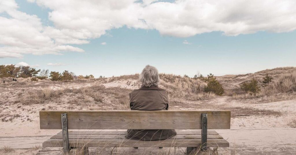 Business professionals reviewing documents during a merger acquisition shredding and records management process in New York